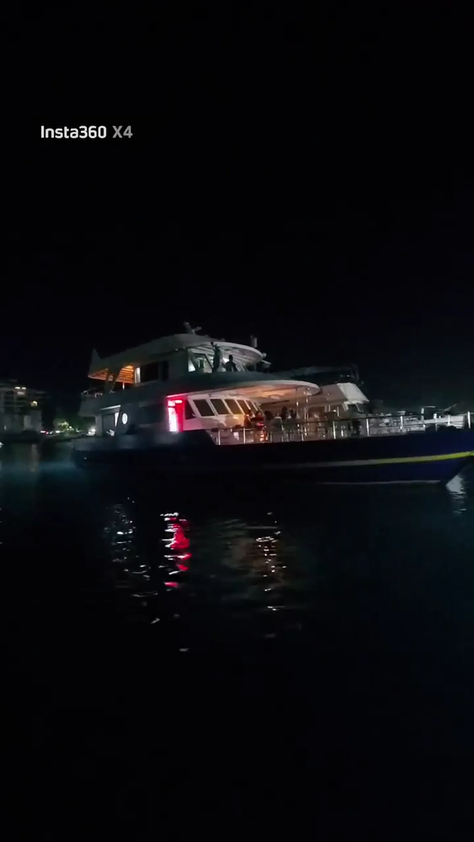 Guests aboard the HIDY yacht at night